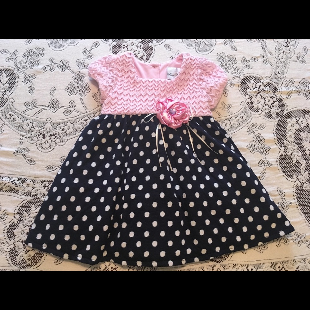 Pink, white, and navy polka dot dress